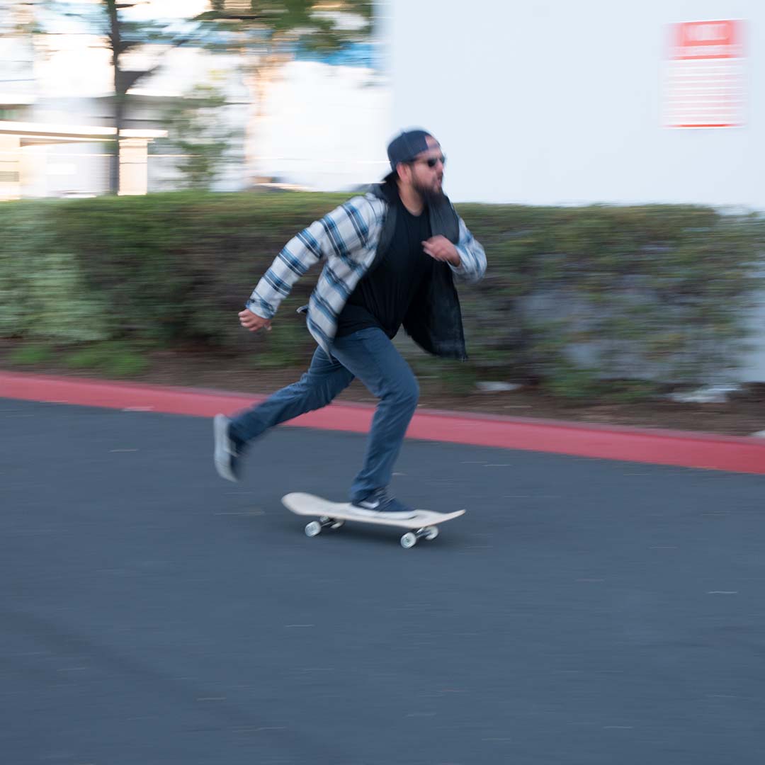 Man skateboarding in Hermana Skateboarding apparel